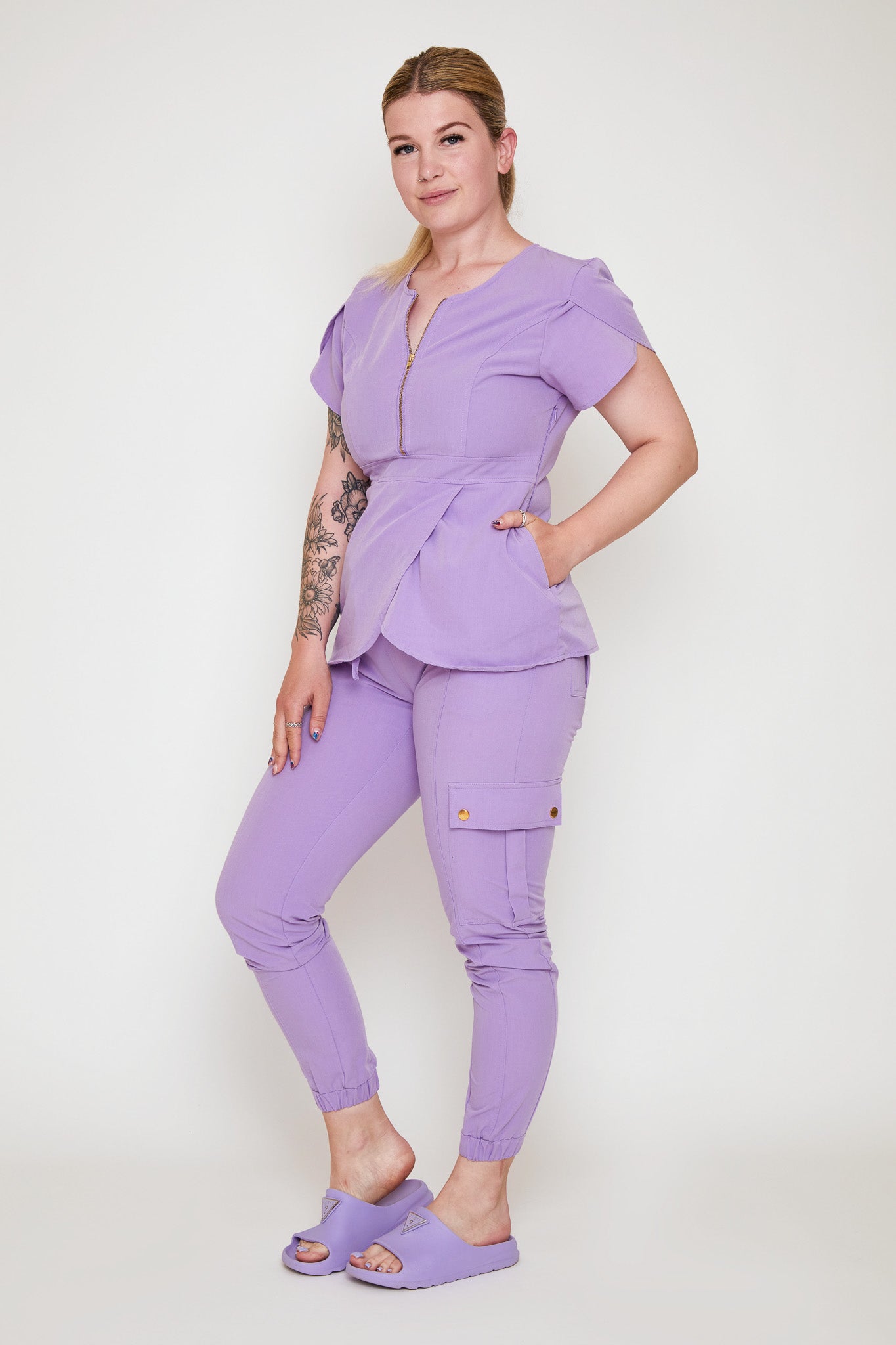 Model wearing Glow Up set in lilac outside modern UK salon